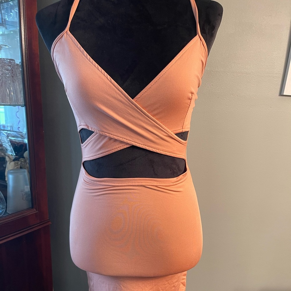 Peach toned dress with cut outs